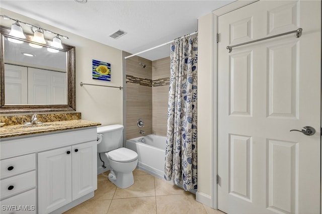 8701 Estero Blvd Unit 105, Bonita Springs, FL 33931 - full bathroom featuring tile patterned flooring, vanity, and shower / bath combo with shower curtain