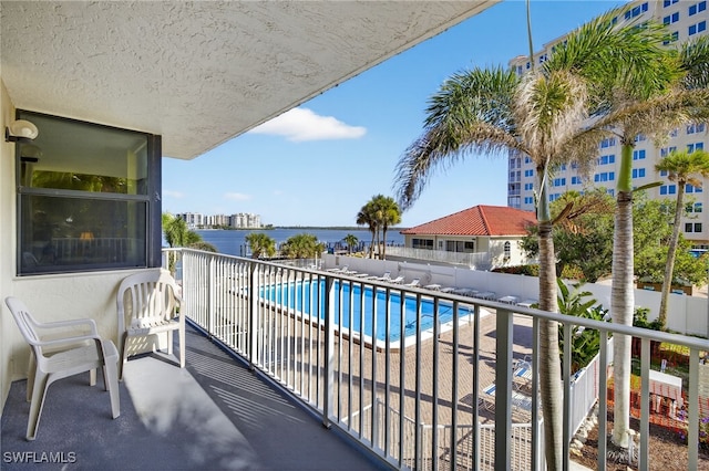 8701 Estero Blvd Unit 105, Bonita Springs, FL 33931 - balcony with view of pool and a water view