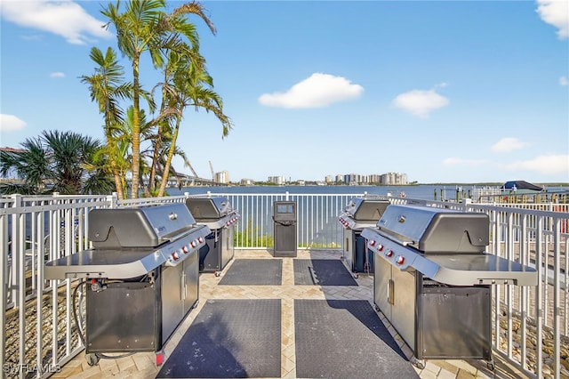 8701 Estero Blvd Unit 105, Bonita Springs, FL 33931 - view of patio featuring area for grilling and a water view