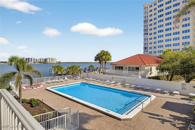 8701 Estero Blvd Unit 105, Bonita Springs, FL 33931 - community pool featuring a water view and a patio