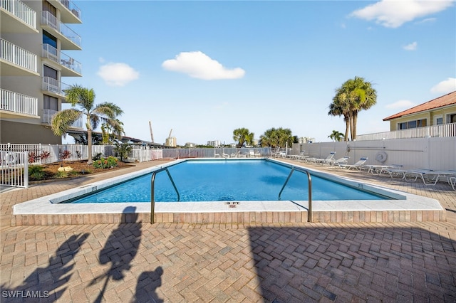 8701 Estero Blvd Unit 105, Bonita Springs, FL 33931 - community pool featuring a patio area