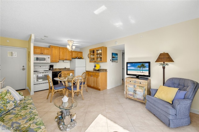 8701 Estero Blvd Unit 105, Bonita Springs, FL 33931 - living area featuring light tile patterned floors