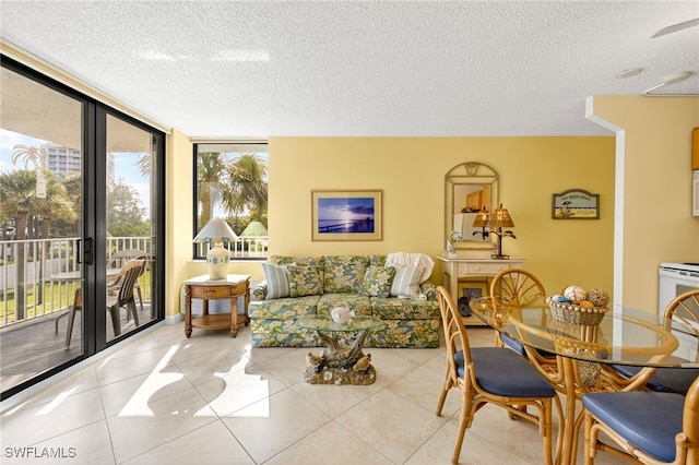 8701 Estero Blvd Unit 105, Bonita Springs, FL 33931 - tiled living area with a textured ceiling