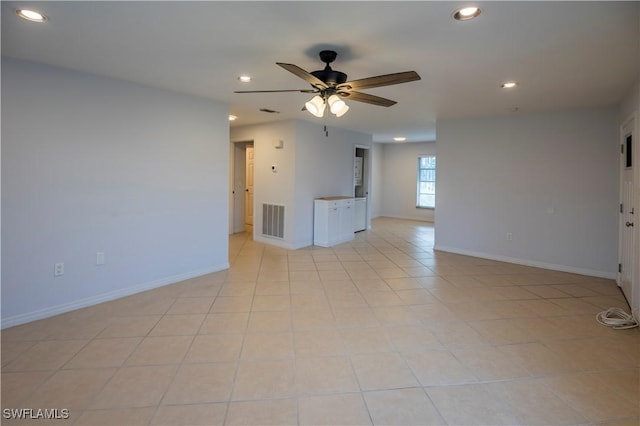 180 Cypress Way E Unit B212, Naples, FL 34110 - empty room with a ceiling fan and recessed lighting