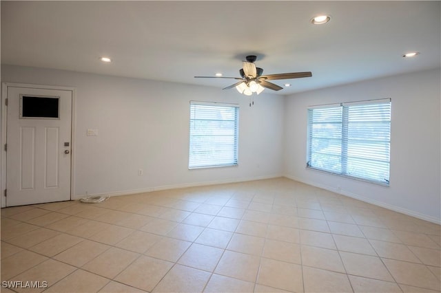 180 Cypress Way E Unit B212, Naples, FL 34110 - unfurnished room with ceiling fan, plenty of natural light, recessed lighting, and light tile patterned floors