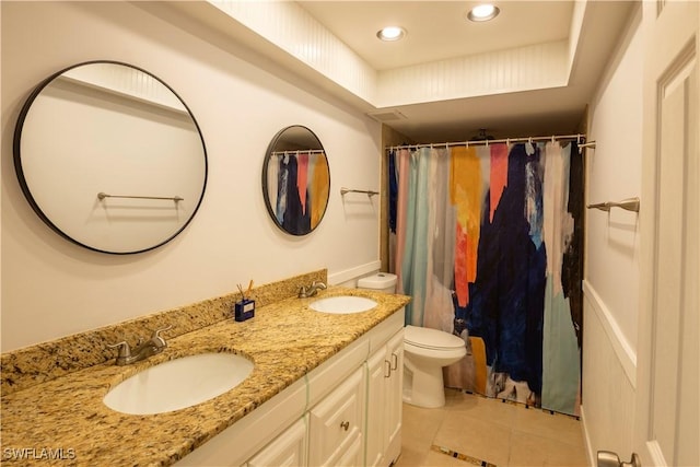 180 Cypress Way E Unit B212, Naples, FL 34110 - bathroom featuring double vanity, tile patterned floors, recessed lighting, and curtained shower