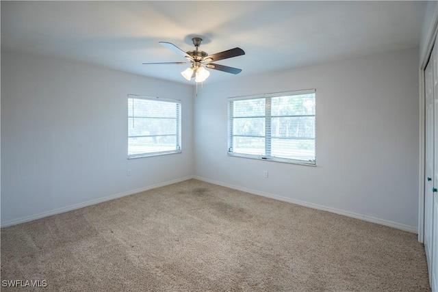 180 Cypress Way E Unit B212, Naples, FL 34110 - spare room with carpet and ceiling fan