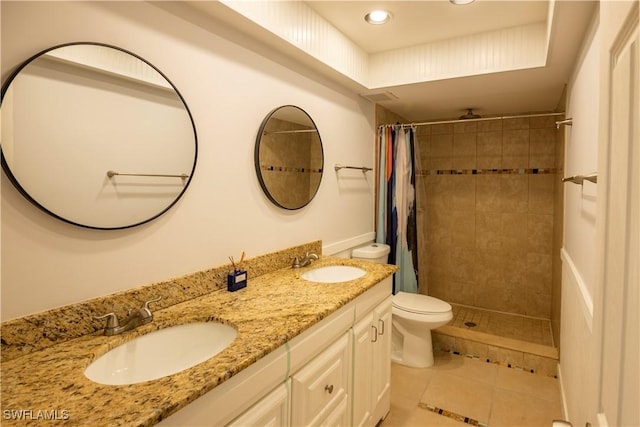 180 Cypress Way E Unit B212, Naples, FL 34110 - bathroom with recessed lighting, double vanity, tiled shower, and tile patterned floors
