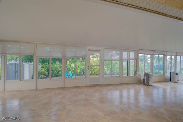 304 NW 22nd Ave, Cape Coral, FL 33993 - unfurnished sunroom with vaulted ceiling