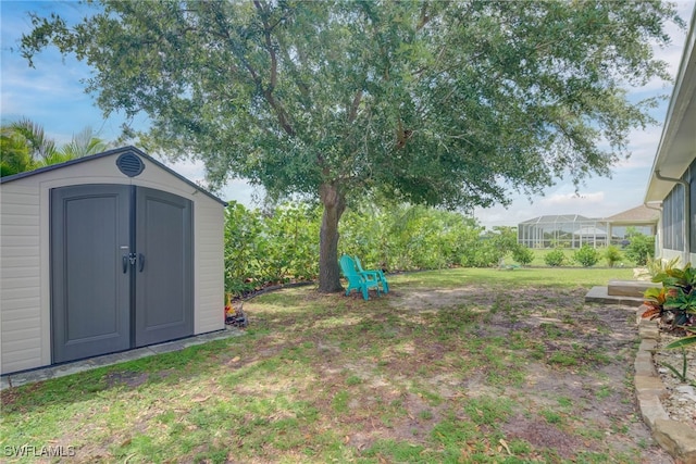 304 NW 22nd Ave, Cape Coral, FL 33993 - view of green lawn featuring a shed