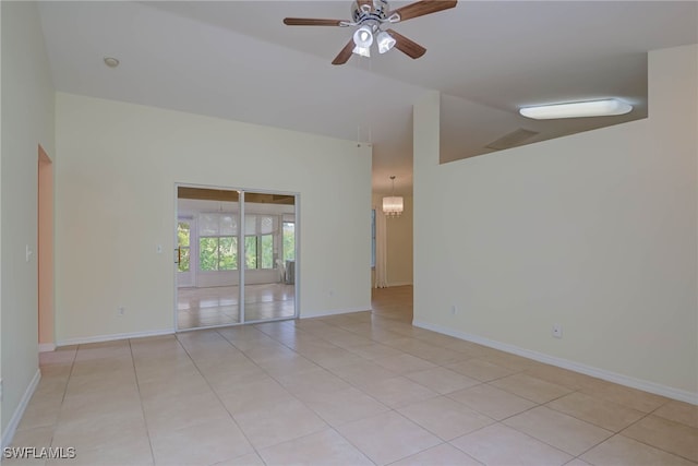 304 NW 22nd Ave, Cape Coral, FL 33993 - unfurnished room featuring ceiling fan, light tile patterned flooring, and high vaulted ceiling