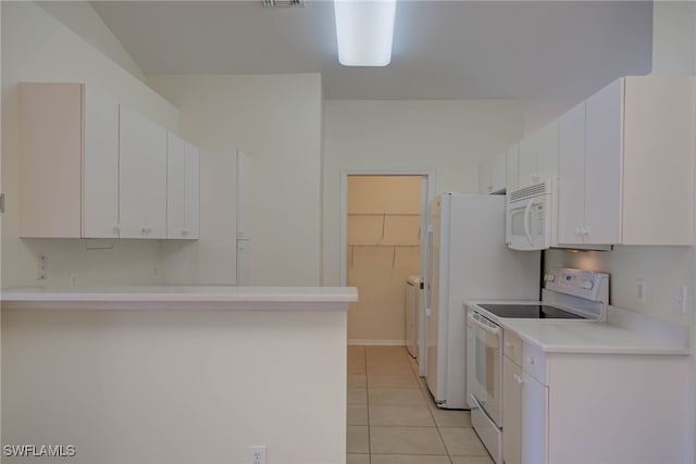 304 NW 22nd Ave, Cape Coral, FL 33993 - kitchen featuring white appliances, light tile patterned floors, light countertops, white cabinetry, and a peninsula
