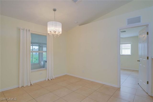 304 NW 22nd Ave, Cape Coral, FL 33993 - unfurnished room with a chandelier, light tile patterned floors, and vaulted ceiling