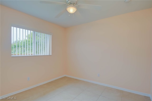 304 NW 22nd Ave, Cape Coral, FL 33993 - empty room featuring a ceiling fan and light tile patterned flooring
