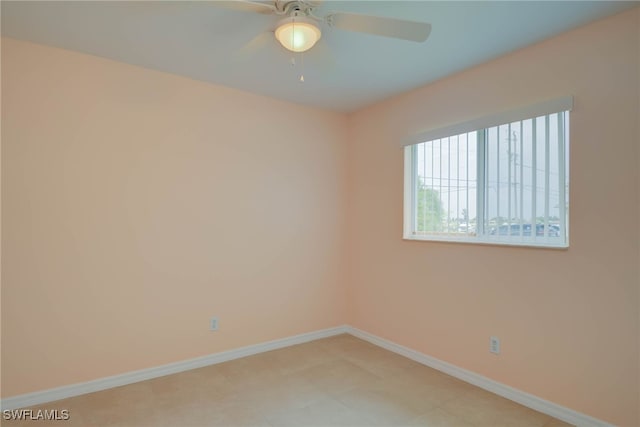 304 NW 22nd Ave, Cape Coral, FL 33993 - empty room with a ceiling fan and baseboards