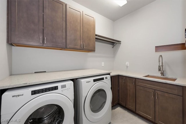 16569 Windsor Way, Alva, FL 33920 - laundry area with washer and dryer and cabinet space