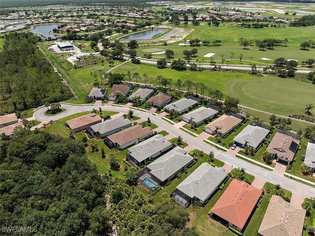 16569 Windsor Way, Alva, FL 33920 - aerial perspective of suburban area with a nearby body of water and a golf course