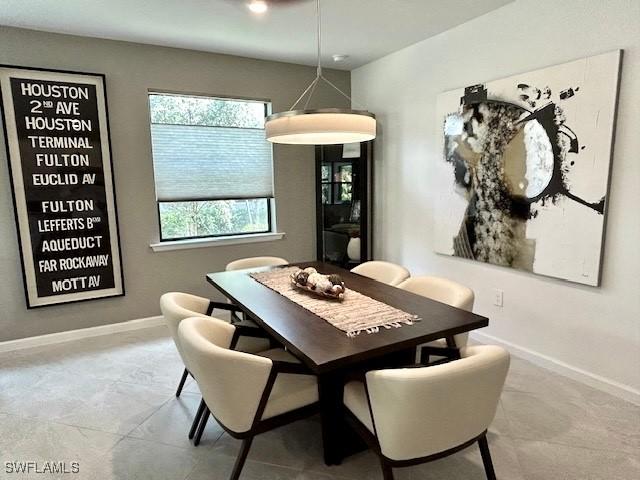16569 Windsor Way, Alva, FL 33920 - dining room featuring baseboards