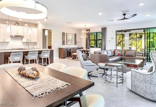 16569 Windsor Way, Alva, FL 33920 - dining space with recessed lighting, wine cooler, a ceiling fan, and light tile patterned floors
