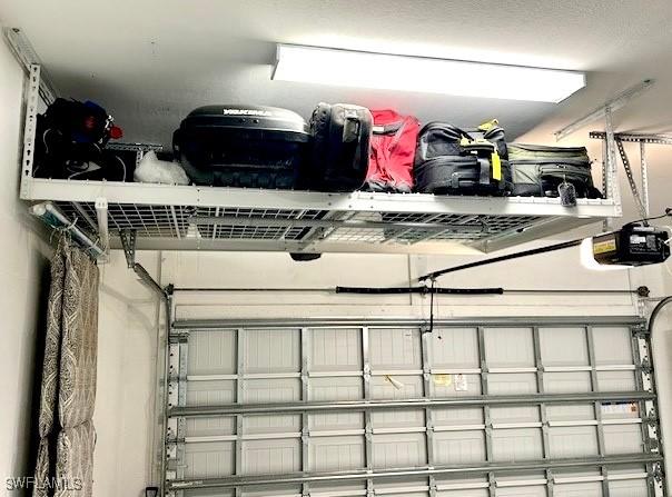 16569 Windsor Way, Alva, FL 33920 - garage with a garage door opener