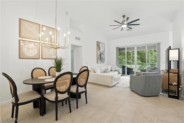 3425 Laurel Greens Ln S Unit 203, Naples, FL 34119 - dining space featuring a chandelier, a ceiling fan, light tile patterned floors, and high vaulted ceiling