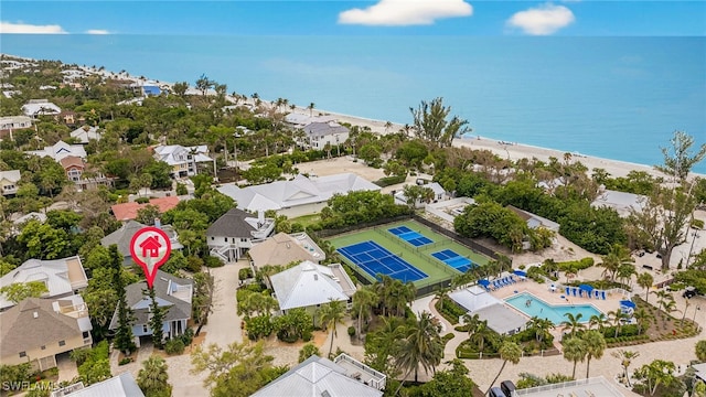 33 Urchin Ct, Captiva, FL 33924 - aerial view of residential area with a pool area and a nearby body of water