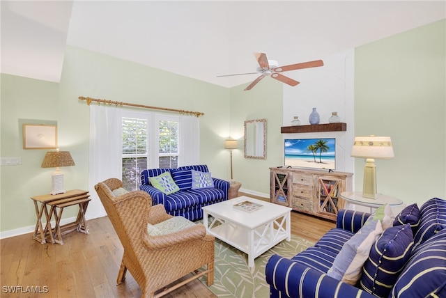 33 Urchin Ct, Captiva, FL 33924 - living area with ceiling fan and wood-type flooring