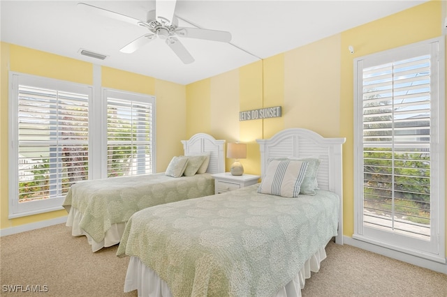33 Urchin Ct, Captiva, FL 33924 - bedroom featuring carpet and multiple windows