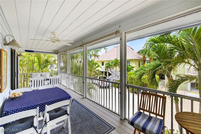 33 Urchin Ct, Captiva, FL 33924 - sunroom / solarium featuring outdoor dining area and a ceiling fan