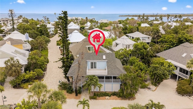 33 Urchin Ct, Captiva, FL 33924 - aerial view of residential area featuring a large body of water