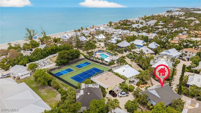 33 Urchin Ct, Captiva, FL 33924 - aerial view of residential area with a nearby body of water and a pool