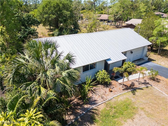 5870 Star Grass Ln, Naples, FL 34116 - view from above of property featuring a tree filled landscape