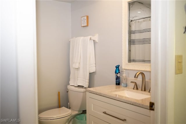 5870 Star Grass Ln, Naples, FL 34116 - bathroom with vanity and toilet