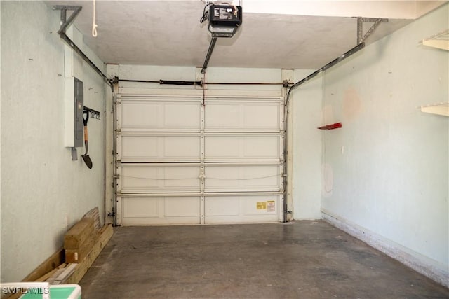 5870 Star Grass Ln, Naples, FL 34116 - garage featuring a garage door opener and electric panel
