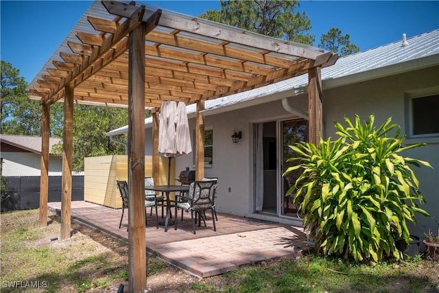 5870 Star Grass Ln, Naples, FL 34116 - view of patio featuring a pergola