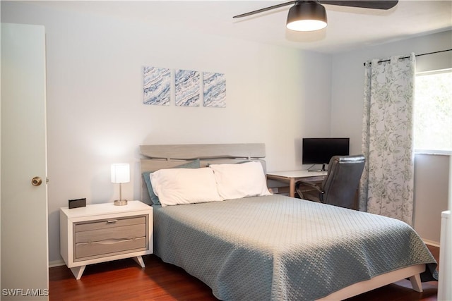 5870 Star Grass Ln, Naples, FL 34116 - bedroom featuring dark wood-style flooring, ceiling fan, and a desk