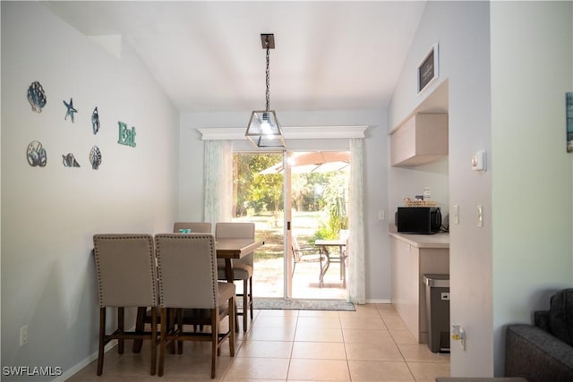 5870 Star Grass Ln, Naples, FL 34116 - dining space with light tile patterned flooring and baseboards