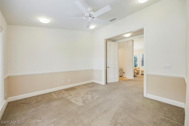 2457 Dorset Ct, Naples, FL 34112 - carpeted empty room featuring baseboards and ceiling fan