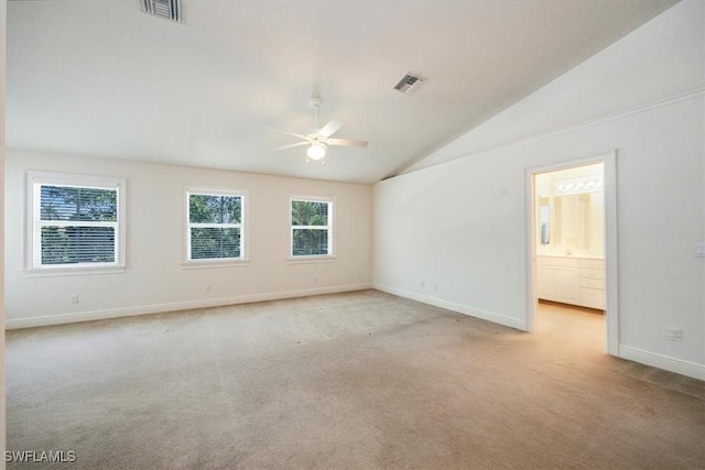 2457 Dorset Ct, Naples, FL 34112 - spare room with ceiling fan, lofted ceiling, and light carpet