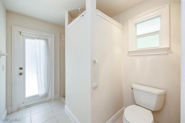 2457 Dorset Ct, Naples, FL 34112 - bathroom featuring plenty of natural light and tile patterned flooring