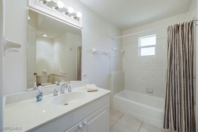 2457 Dorset Ct, Naples, FL 34112 - full bath with tile patterned floors, vanity, and shower / tub combo