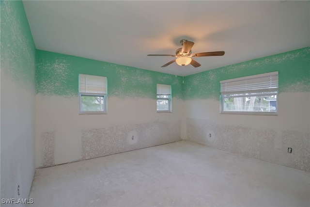 330 Shore Dr, Fort Myers, FL 33905 - spare room with a ceiling fan and concrete floors