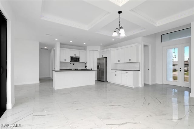 5300 3rd St W, Lehigh Acres, FL 33971 - kitchen featuring dark countertops, open floor plan, recessed lighting, decorative backsplash, and coffered ceiling