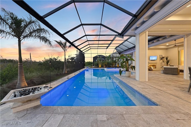 8923 Nevis Way, Naples, FL 34112 - outdoor pool featuring a patio area, a lanai, and outdoor lounge area