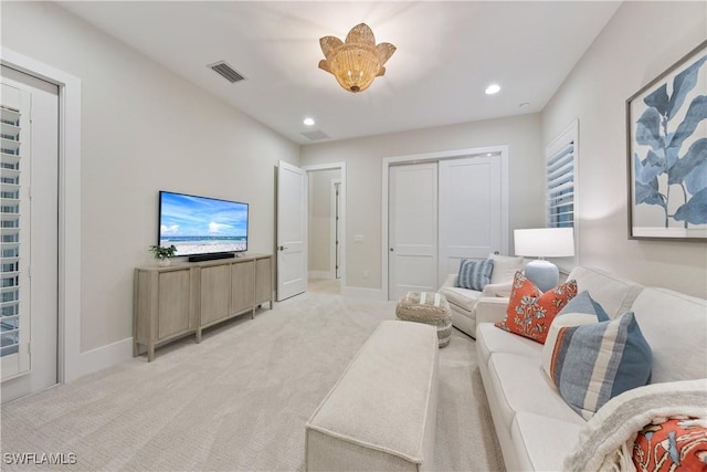8923 Nevis Way, Naples, FL 34112 - living area featuring light carpet and recessed lighting
