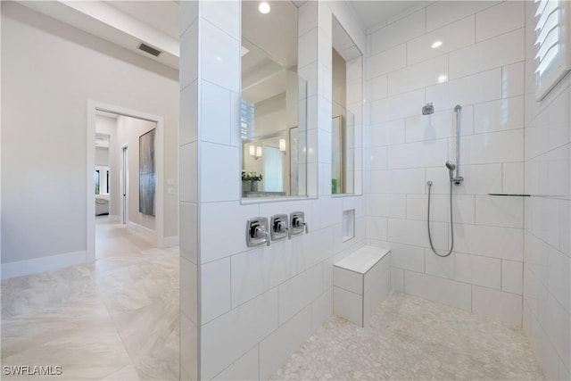 8923 Nevis Way, Naples, FL 34112 - full bathroom featuring a tile shower and baseboards