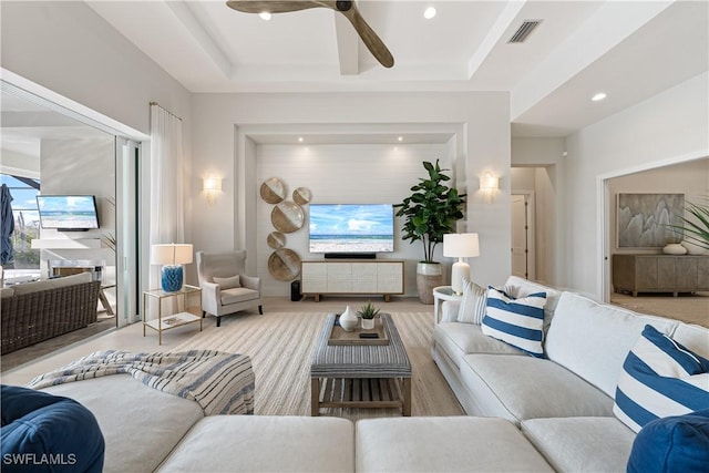 8923 Nevis Way, Naples, FL 34112 - living area featuring ceiling fan, recessed lighting, and a tray ceiling