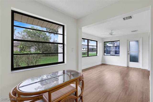 4925 Molokai Dr Unit 16, Naples, FL 34112 - dining room with wood finished floors and ceiling fan