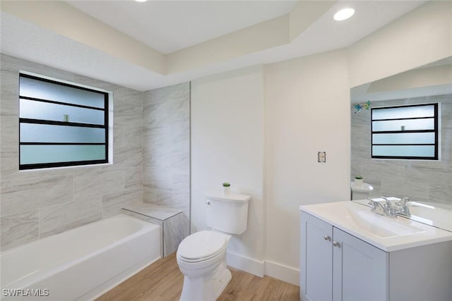 4925 Molokai Dr Unit 16, Naples, FL 34112 - bathroom featuring wood finished floors and vanity