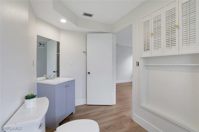 4925 Molokai Dr Unit 16, Naples, FL 34112 - bathroom with vanity, wood finished floors, and recessed lighting